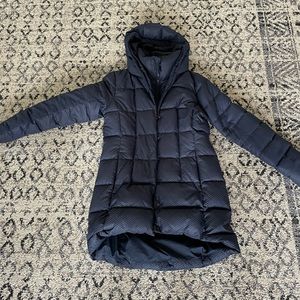 Textured North Face winter coat.